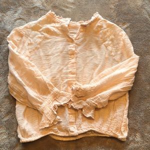 Free people long sleeve ruffle shirt. Blushy cream color